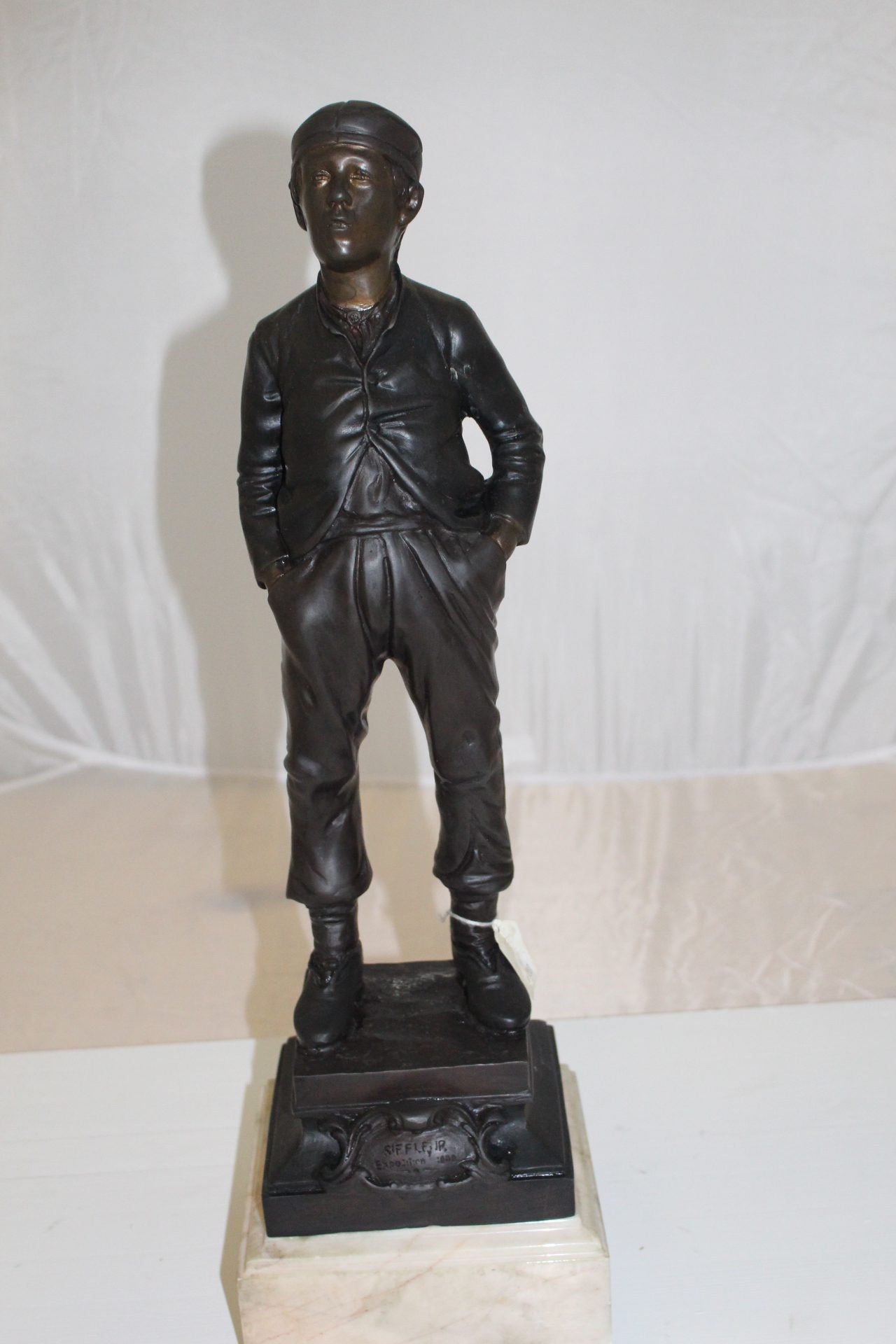 Boy standing Bronze Statue -  Size: 7.5"L x 7.5"W x 23.5"H. 