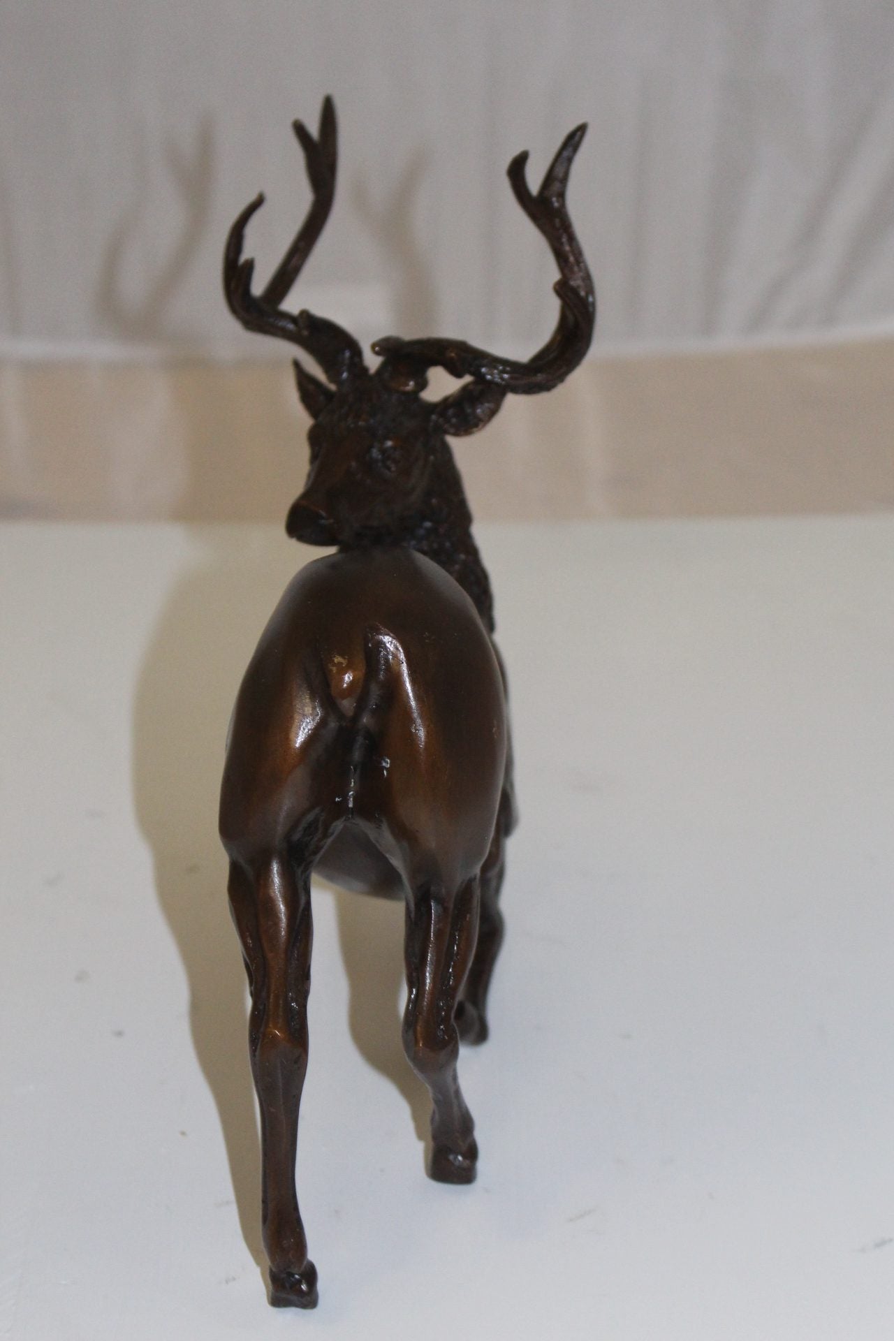 Deer Bronze Statue -  Size: 12"L x 5"W x 10.5"H. 