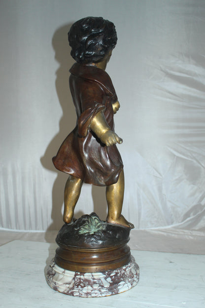 Boy standing Bronze Statue on Marble base -  Size: 10"L x 12"W x 26"H. 