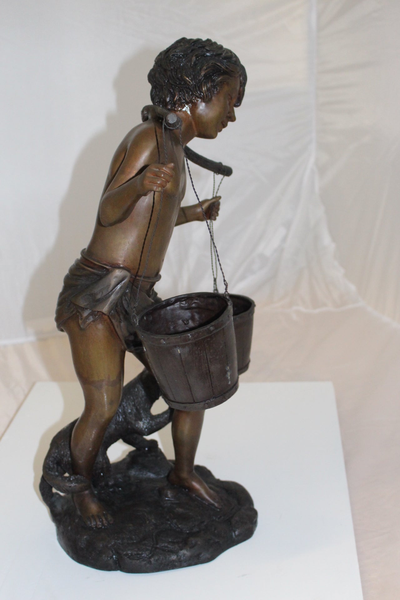 Boy with two buckets Bronze Statue -  Size: 14.5"L x 10"W x 23"H. 