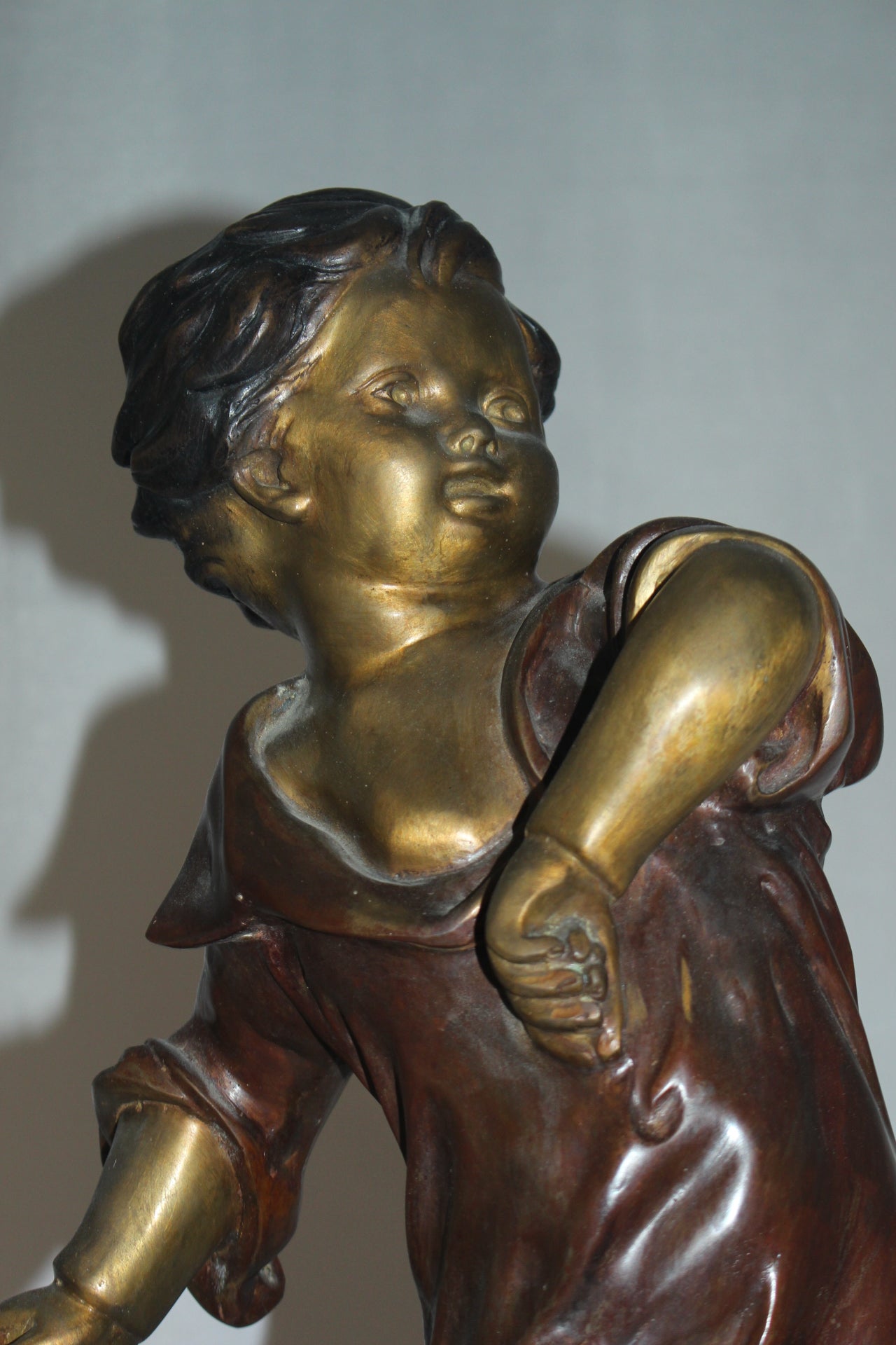 Boy standing Bronze Statue on Marble base -  Size: 10"L x 12"W x 26"H. 