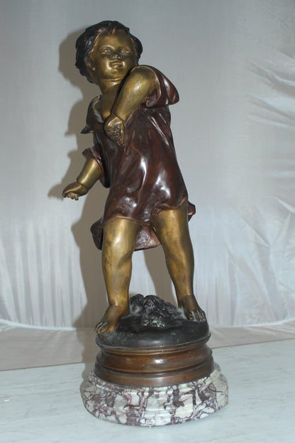 Boy standing Bronze Statue on Marble base -  Size: 10"L x 12"W x 26"H. 