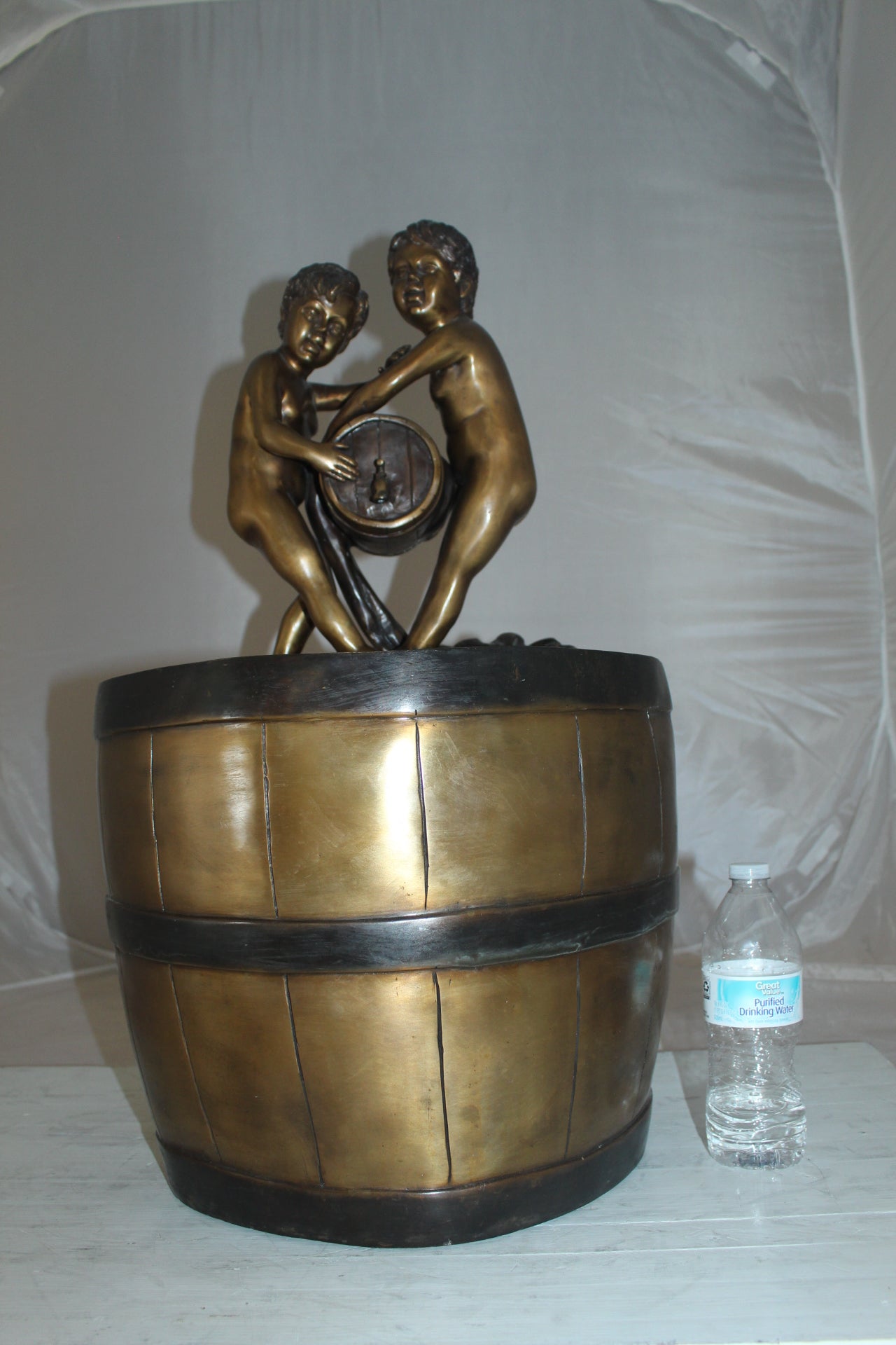 Two boys on a bucket self-contained fountain bronze statue -  16" x 16" x 29"H. 