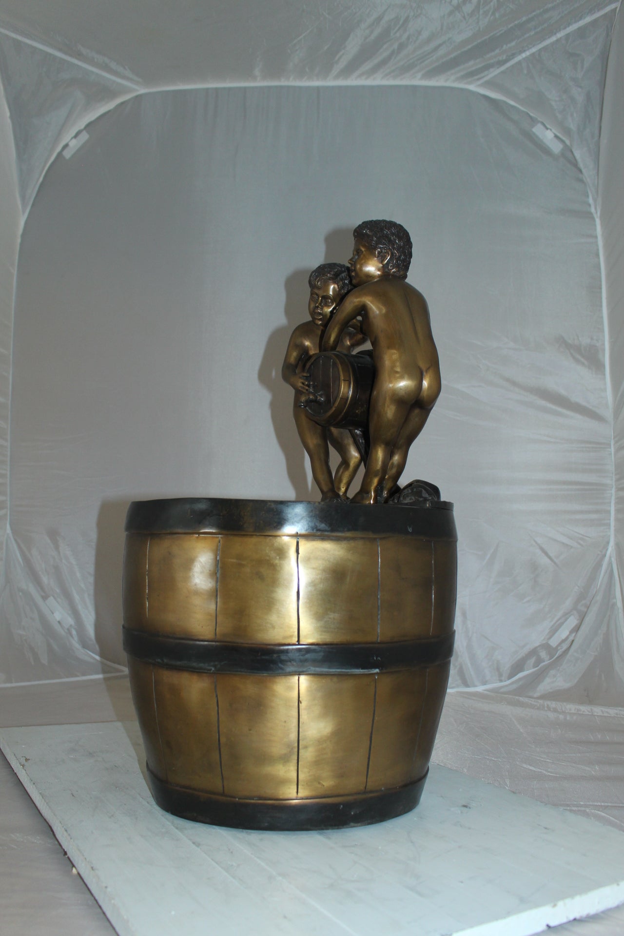 Two boys on a bucket self-contained fountain bronze statue -  16" x 16" x 29"H. 