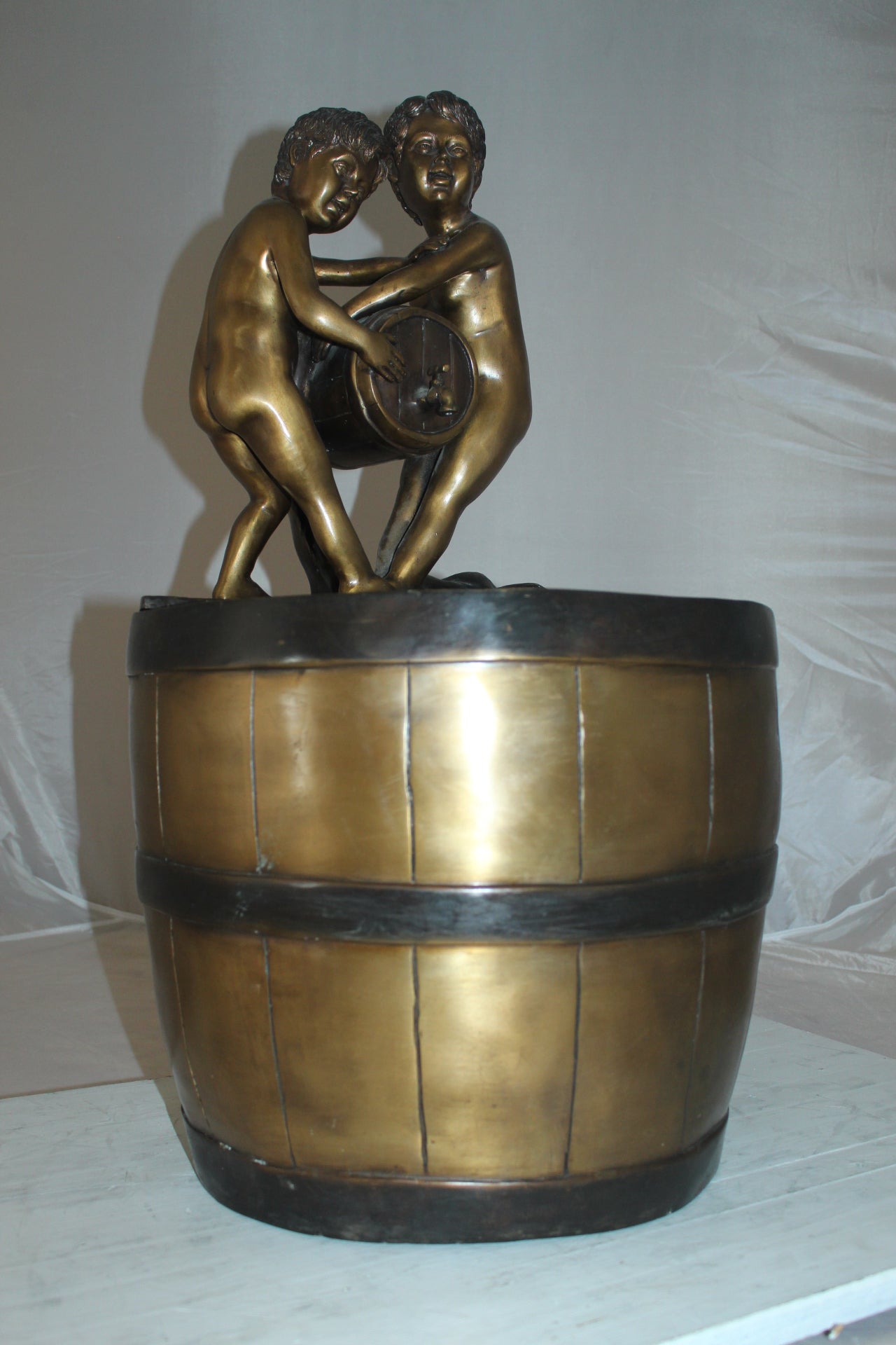 Two boys on a bucket self-contained fountain bronze statue -  16" x 16" x 29"H. 