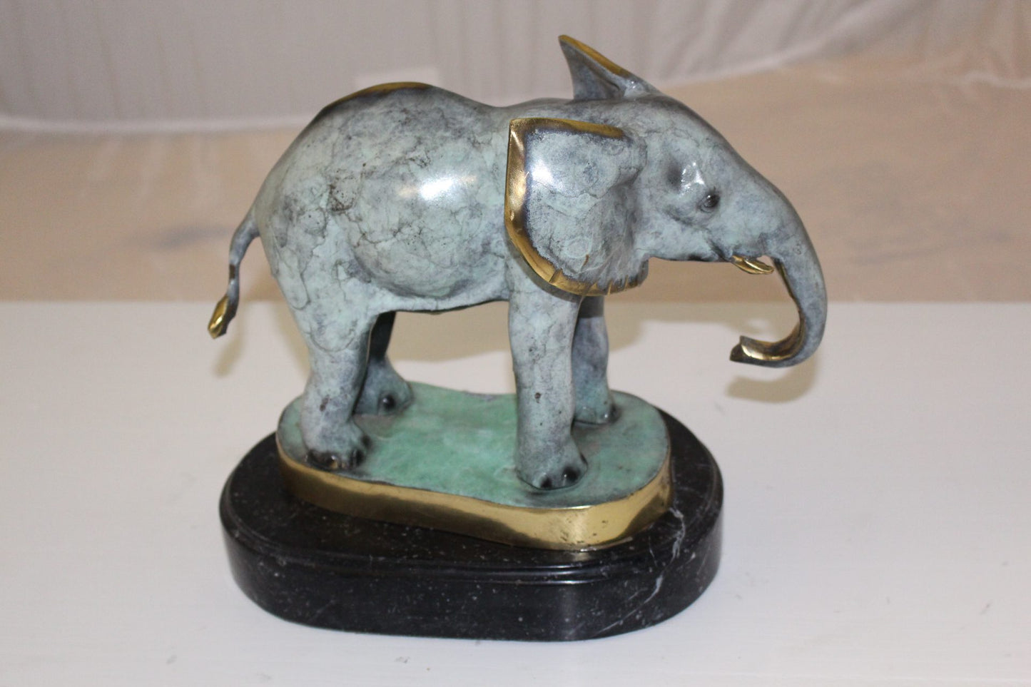 Elephant Bronze Statue -  Size: 11"L x 8"W x 10"H. 