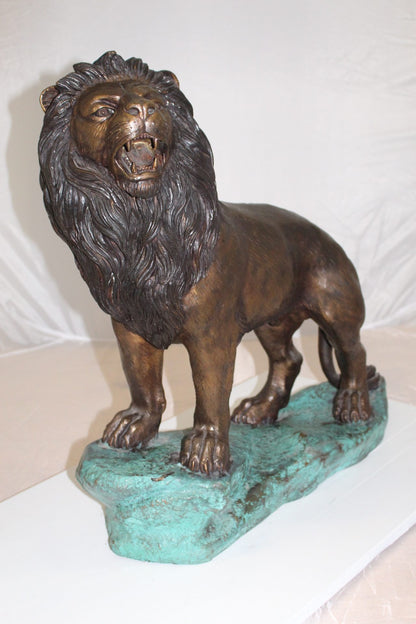Lion Standing Bronze Statue -  Size: 26"L x 10"W x 25"H. 