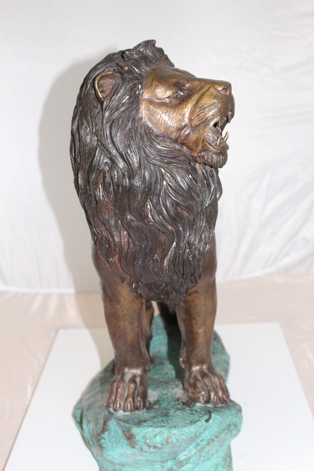 Lion Standing Bronze Statue -  Size: 26"L x 10"W x 25"H. 