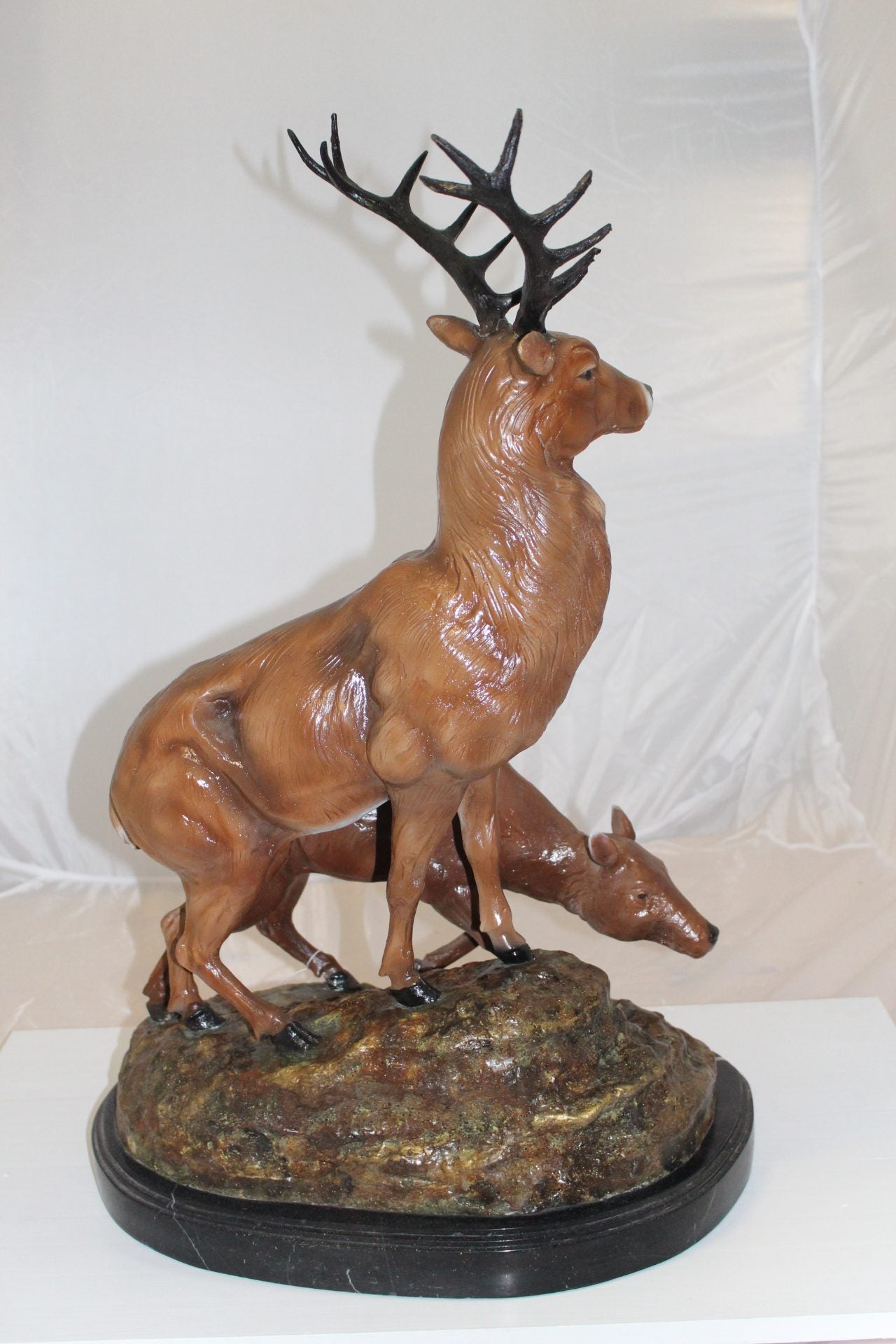 Two Deers Bronze Statue -  Size: 21"L x 13"W x 32"H. 