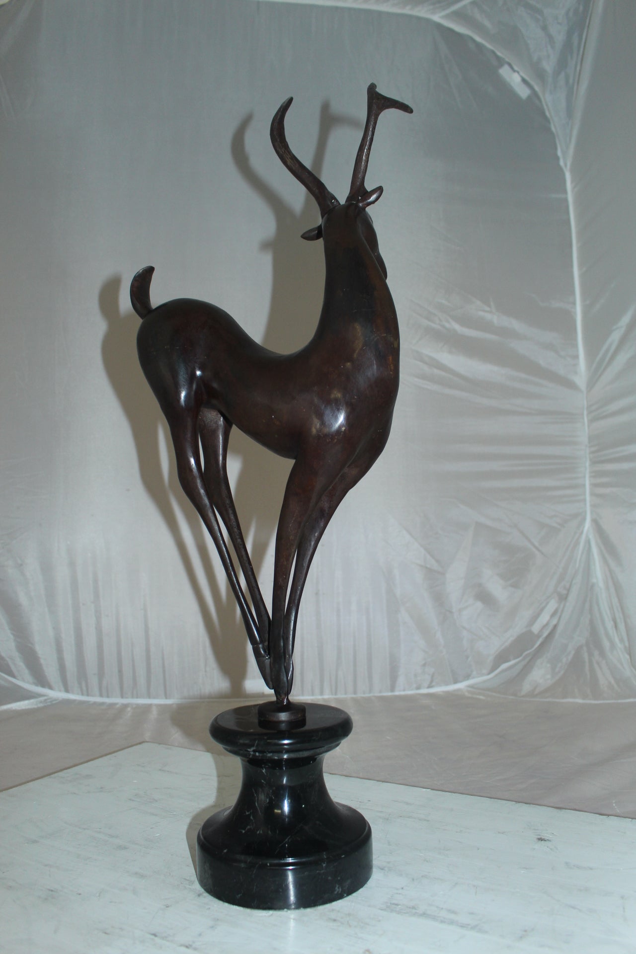 Deer standing Bronze Statue -  Size: 12"L x 7"W x 30"H. 