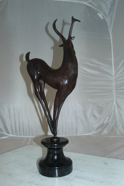 Deer standing Bronze Statue -  Size: 12"L x 7"W x 30"H. 
