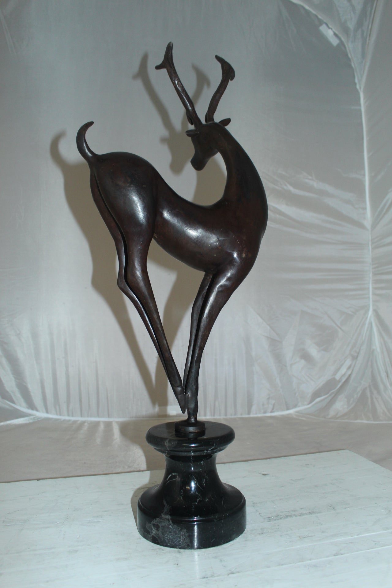 Deer standing Bronze Statue -  Size: 12"L x 7"W x 30"H. 