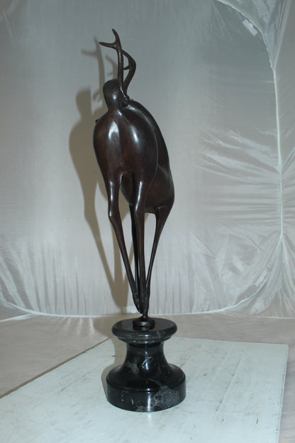 Deer standing Bronze Statue -  Size: 12"L x 7"W x 30"H. 