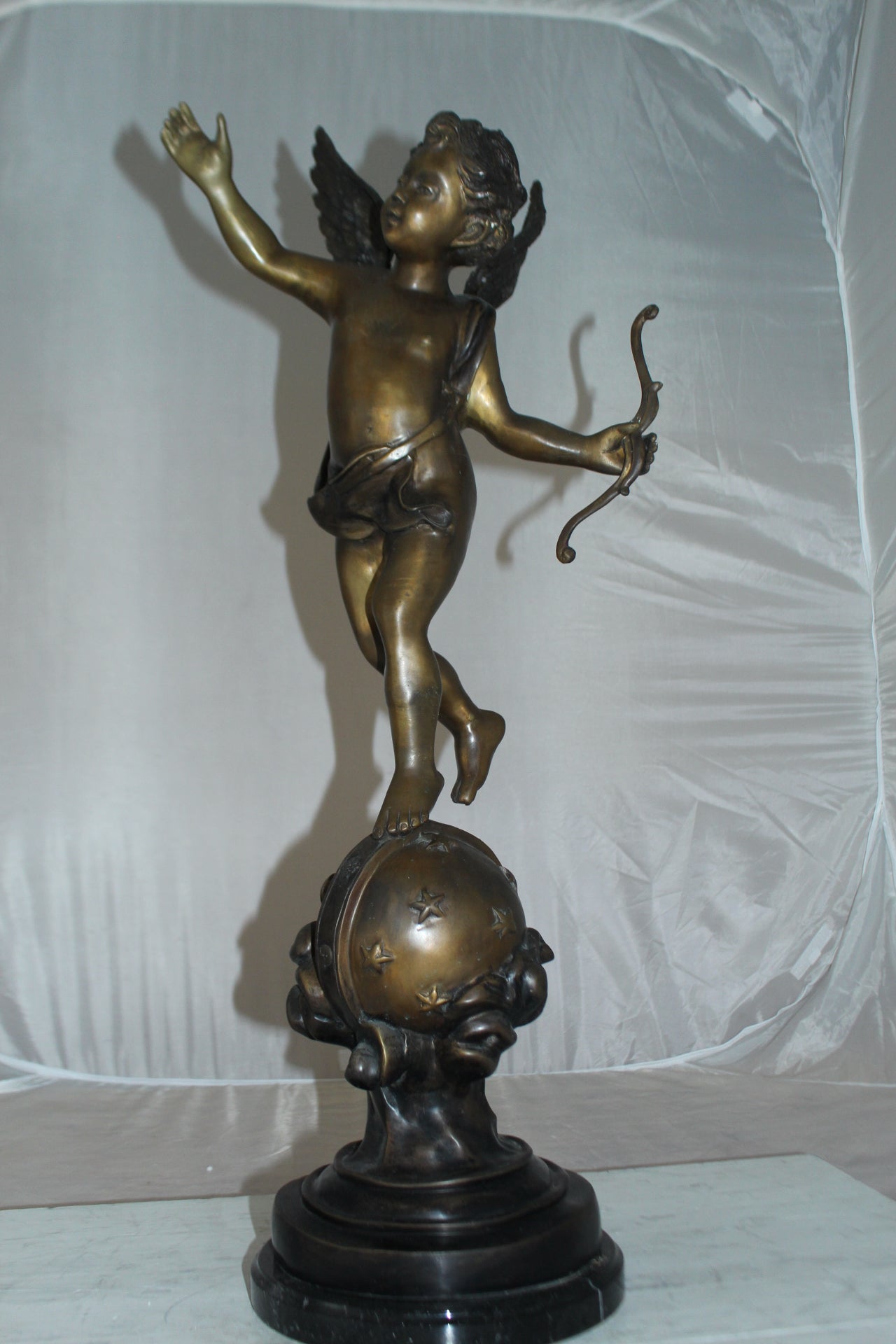 Angel on Earth Bronze Statue -  Size: 10"L x 13"W x 32"H. 