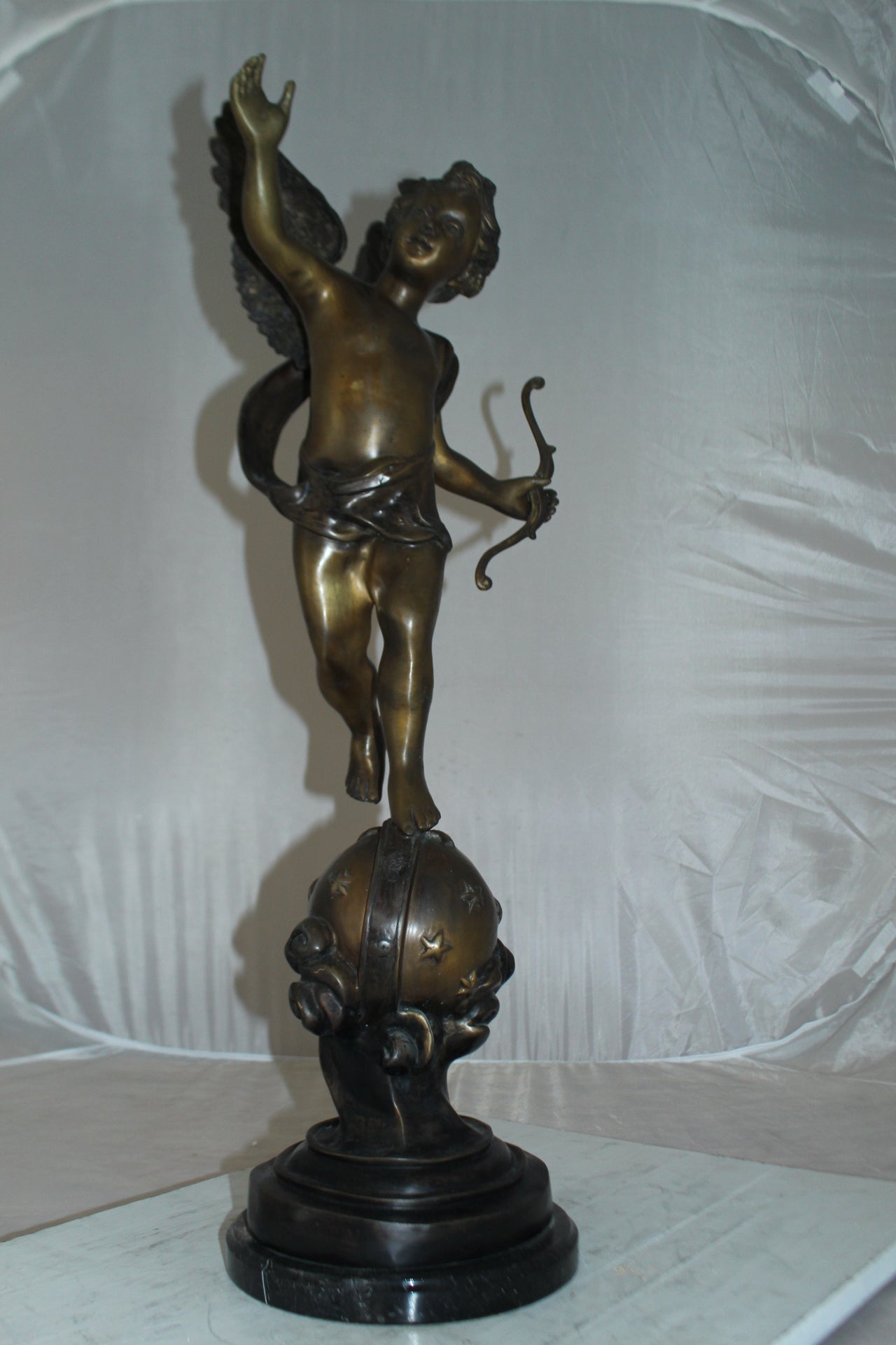 Angel on Earth Bronze Statue -  Size: 10"L x 13"W x 32"H. 
