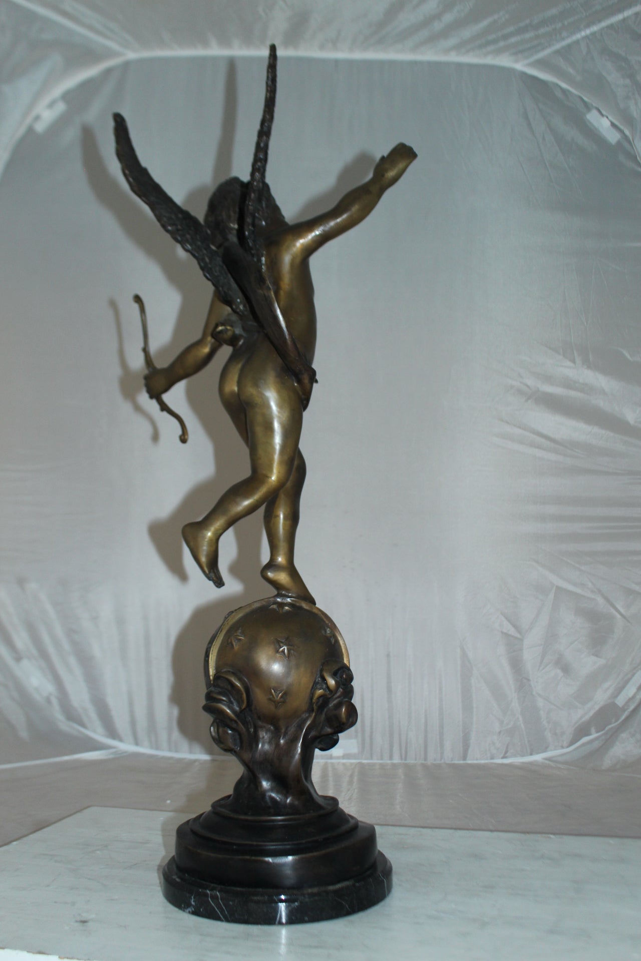 Angel on Earth Bronze Statue -  Size: 10"L x 13"W x 32"H. 