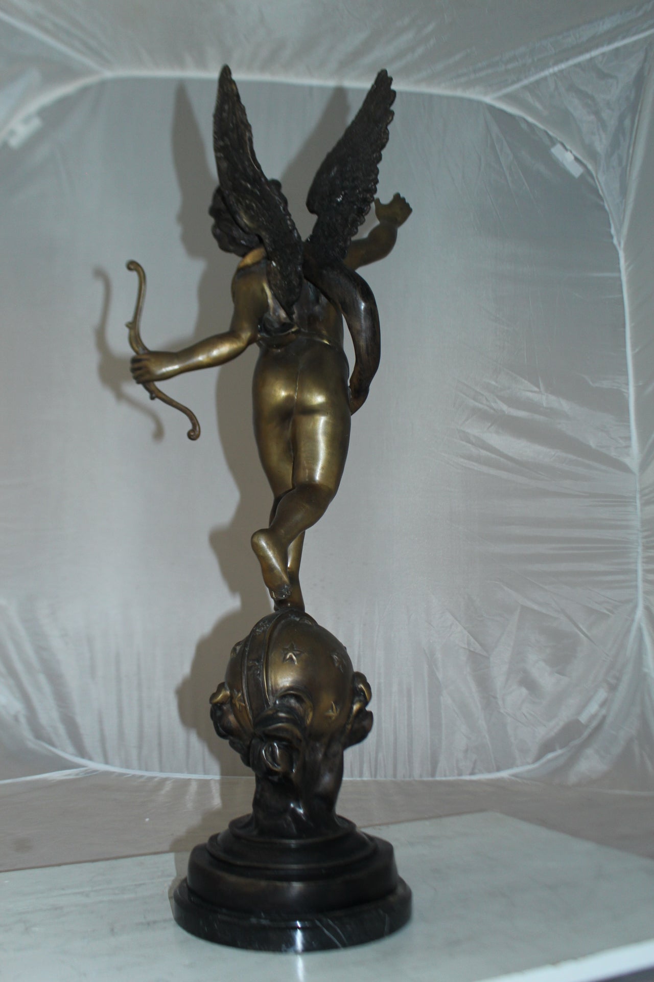 Angel on Earth Bronze Statue -  Size: 10"L x 13"W x 32"H. 