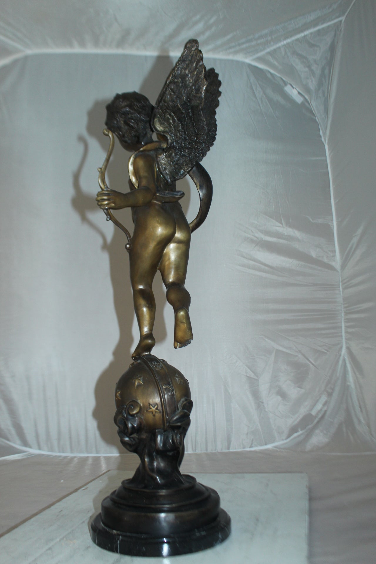 Angel on Earth Bronze Statue -  Size: 10"L x 13"W x 32"H. 