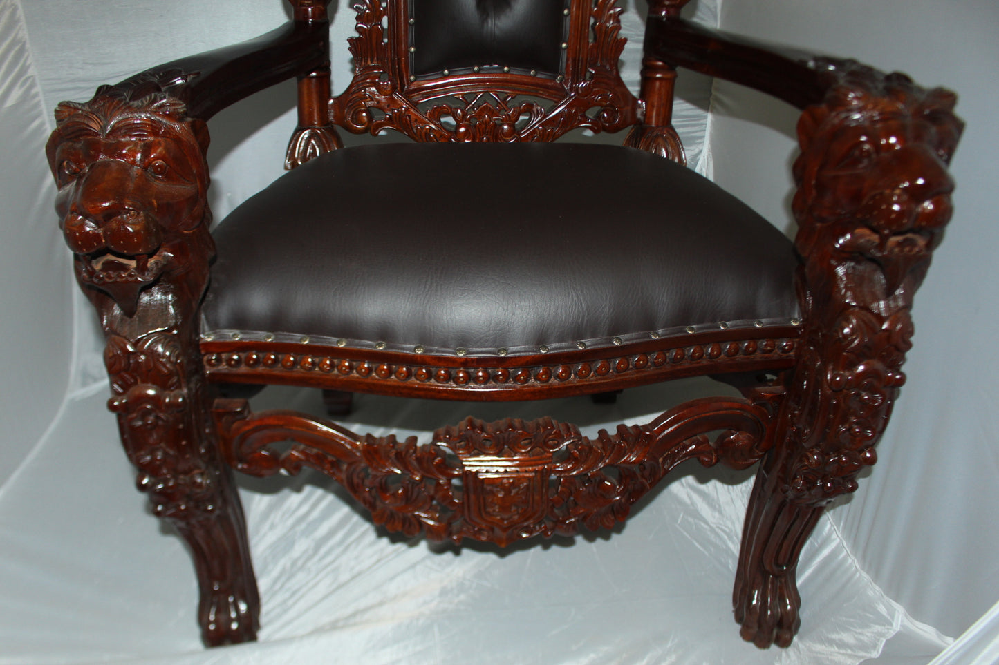 Brown Lion Chair -  Size: 70"L x 36"W x 26"H. 
