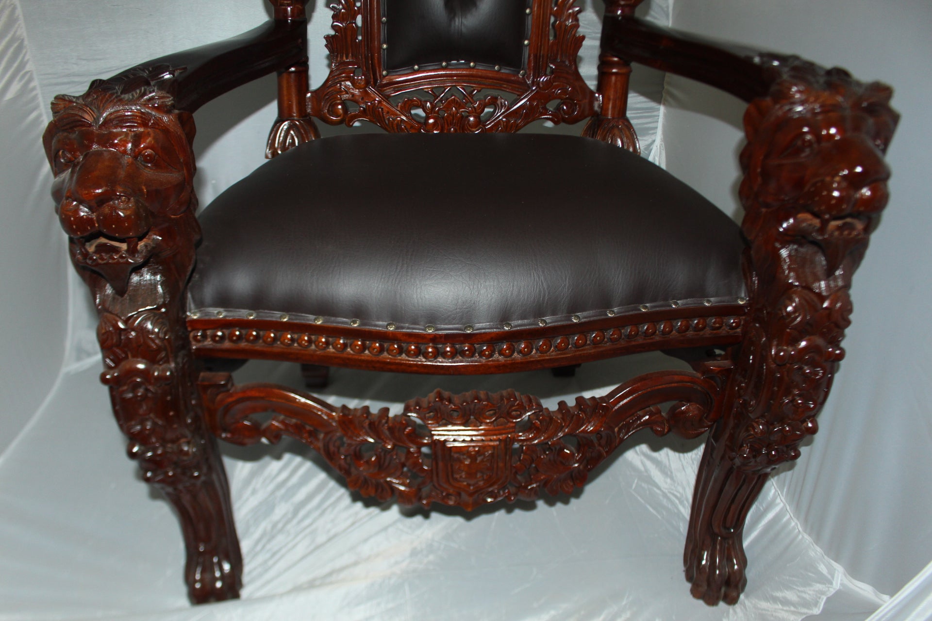 Brown Lion Chair -  Size: 70"L x 36"W x 26"H. 