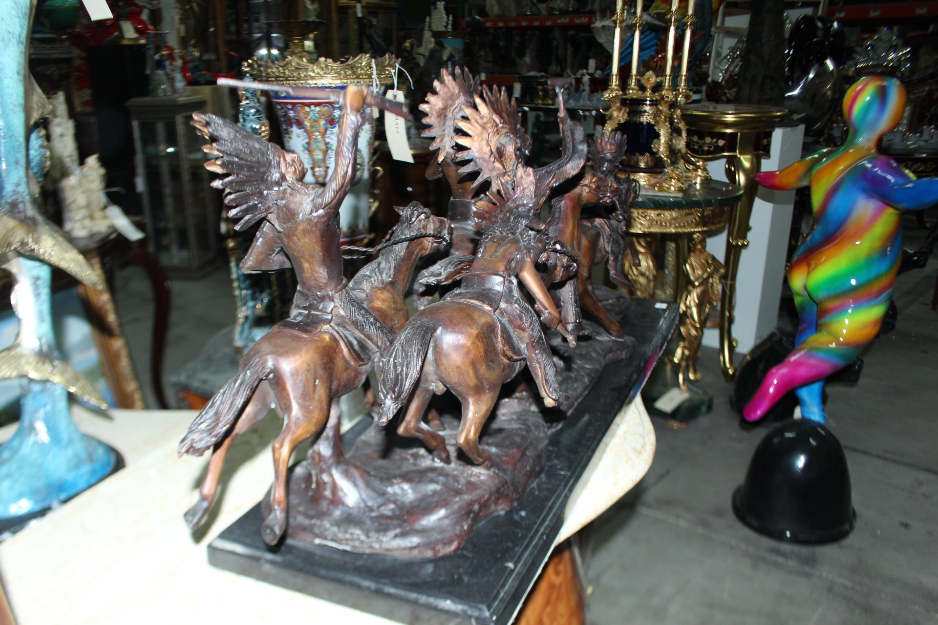 War party Bronze Statue by Carl Cauba -  Size: 39"L x 10"W x 15"H. 