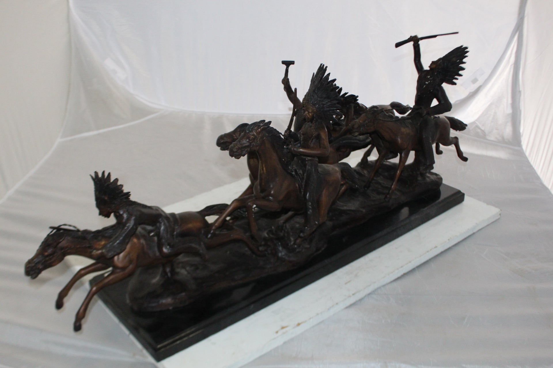 War party Bronze Statue by Carl Cauba -  Size: 39"L x 10"W x 15"H. 