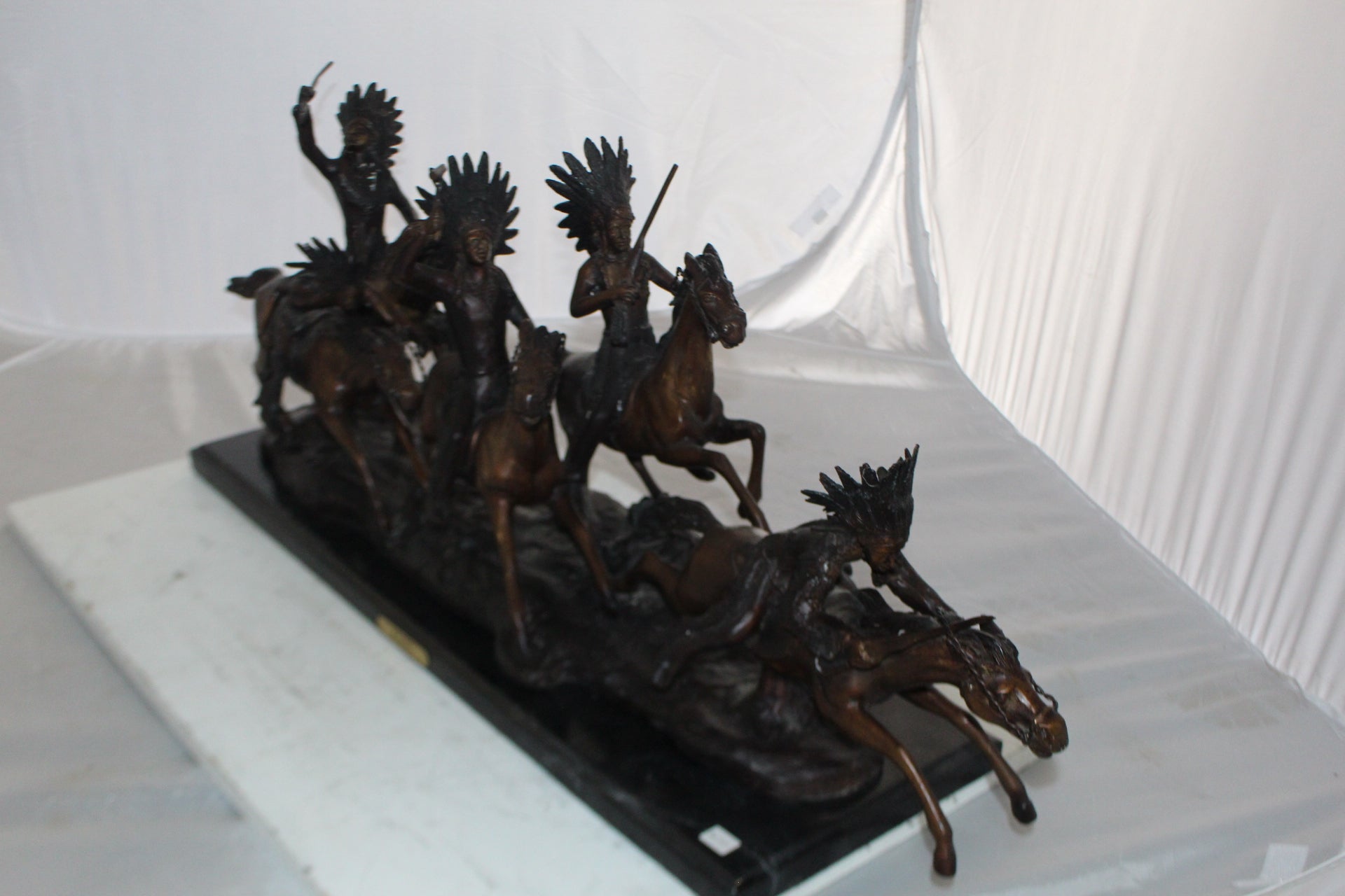 War party Bronze Statue by Carl Cauba -  Size: 39"L x 10"W x 15"H. 