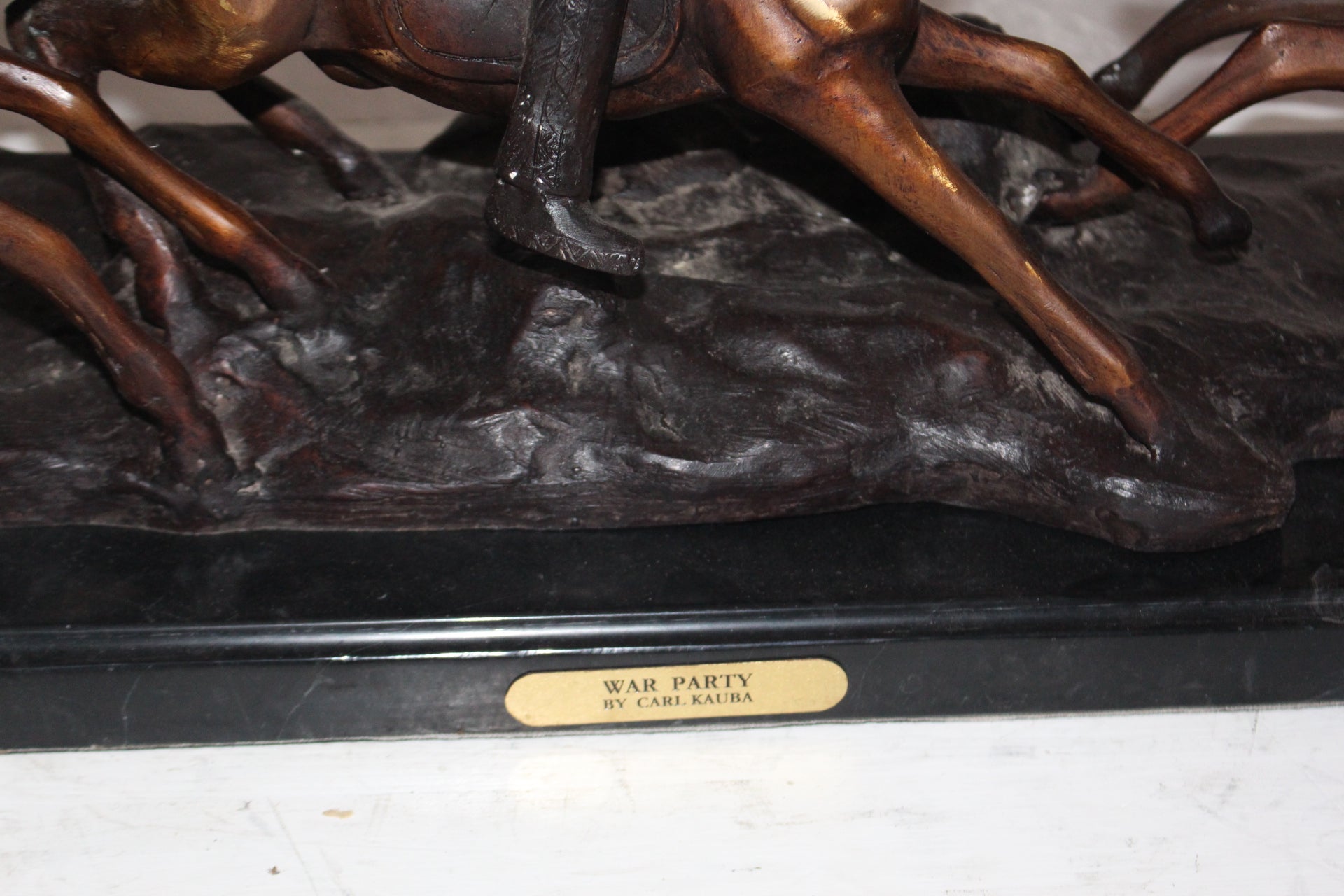 War party Bronze Statue by Carl Cauba -  Size: 39"L x 10"W x 15"H. 