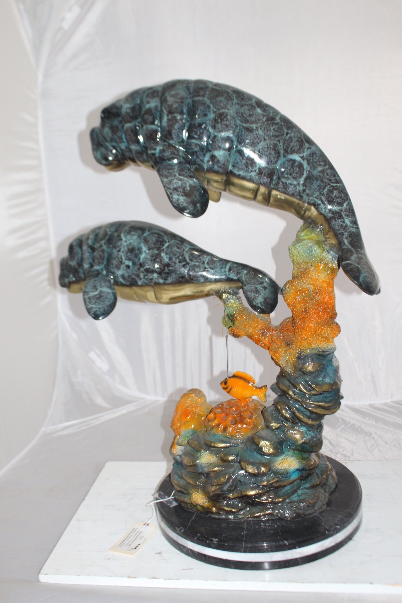 Manatees swimming - large Bronze Statue -  Size: 18"L x 28"W x 38"H. 