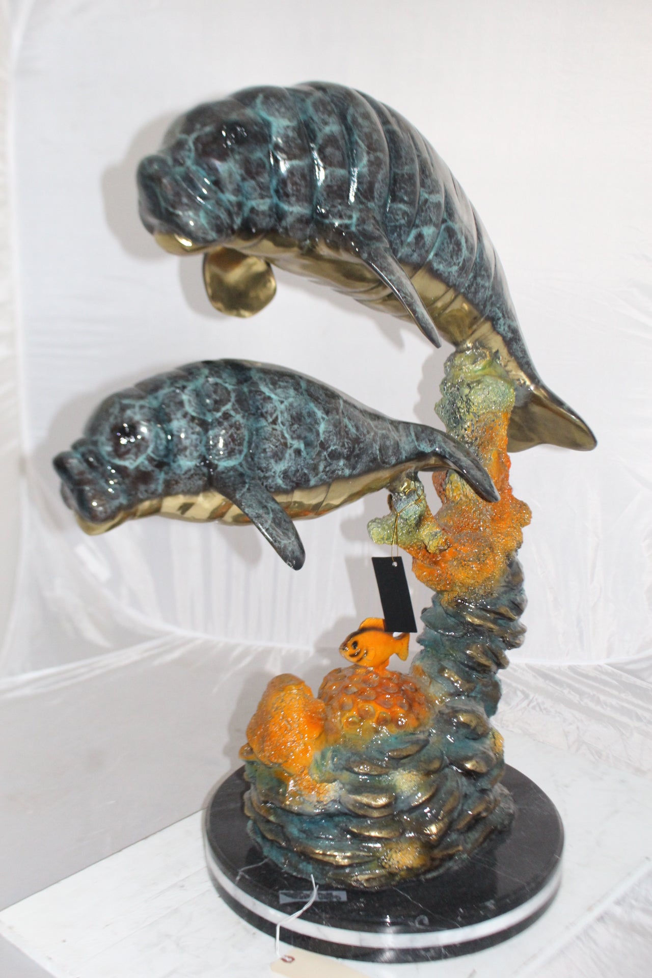 Manatees swimming - large Bronze Statue -  Size: 18"L x 28"W x 38"H. 