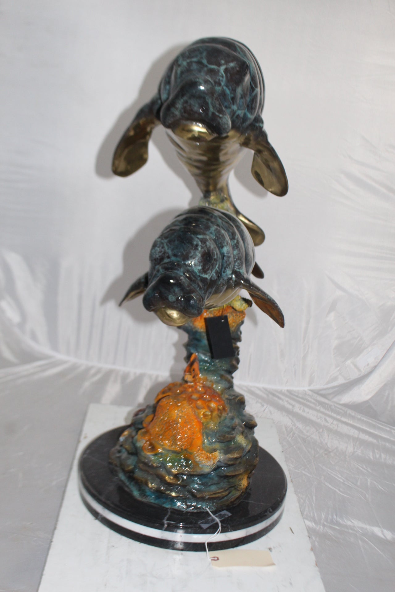 Manatees swimming - large Bronze Statue -  Size: 18"L x 28"W x 38"H. 