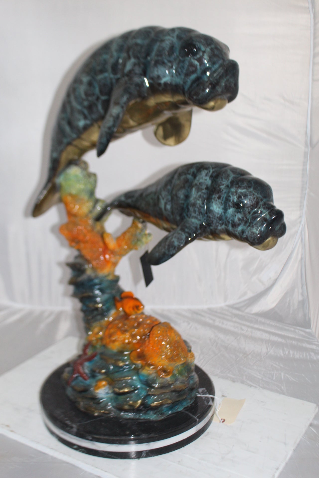 Manatees swimming - large Bronze Statue -  Size: 18"L x 28"W x 38"H. 
