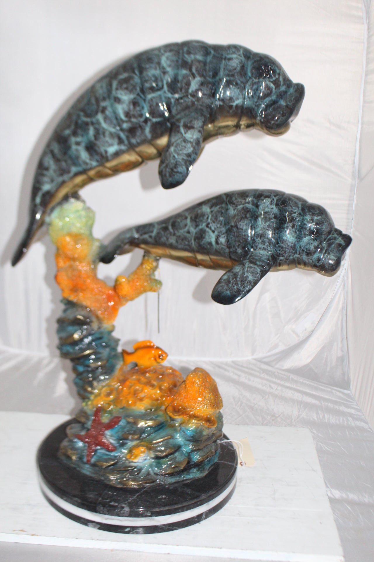 Manatees swimming - large Bronze Statue -  Size: 18"L x 28"W x 38"H. 