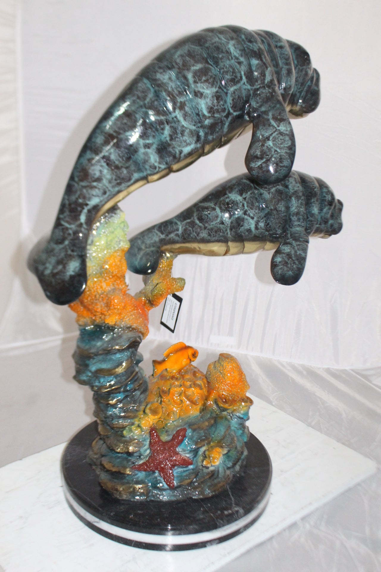Manatees swimming - large Bronze Statue -  Size: 18"L x 28"W x 38"H. 