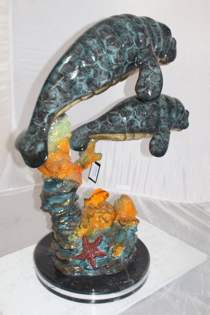 Manatees swimming - large Bronze Statue -  Size: 18"L x 28"W x 38"H. 
