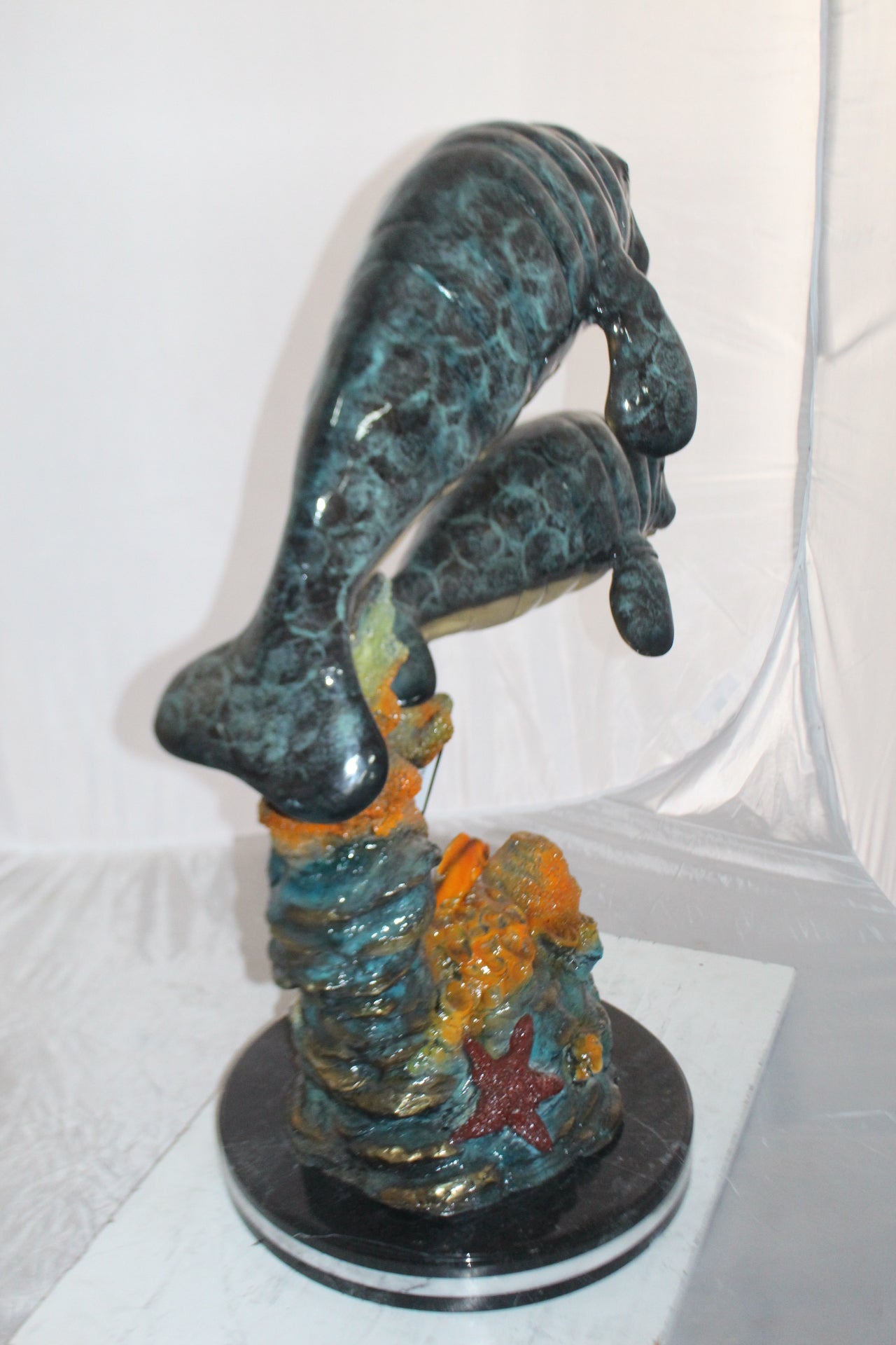 Manatees swimming - large Bronze Statue -  Size: 18"L x 28"W x 38"H. 