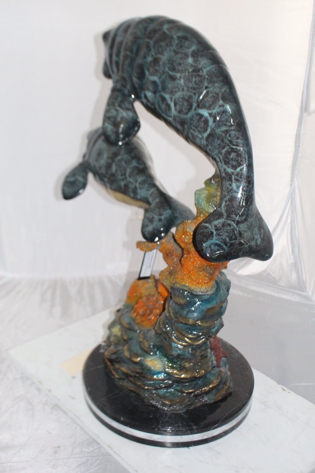 Manatees swimming - large Bronze Statue -  Size: 18"L x 28"W x 38"H. 
