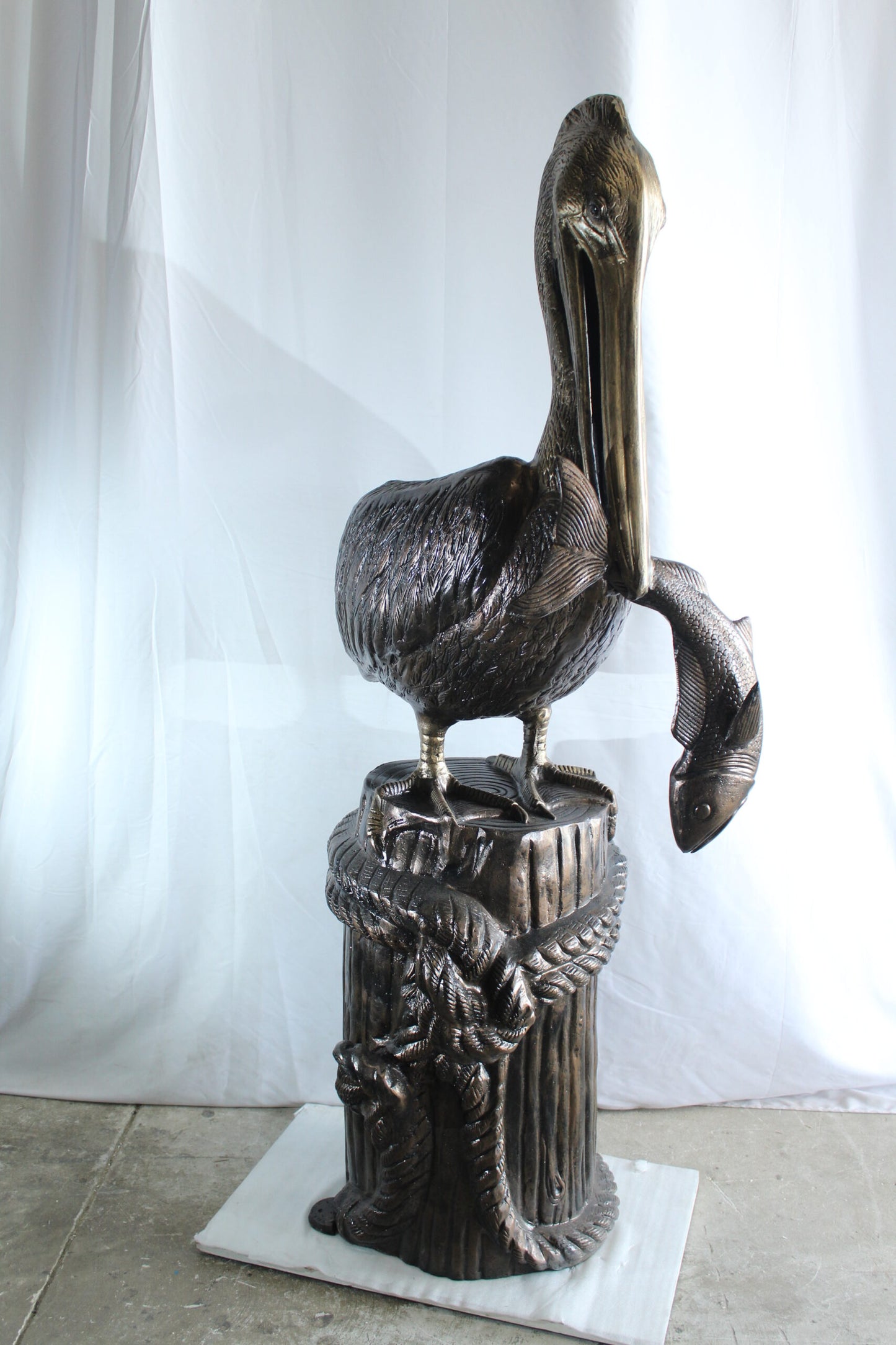 Giant Aluminum Pelican Statue Catching Fish on Dock Post 40" x 33" x 78"H