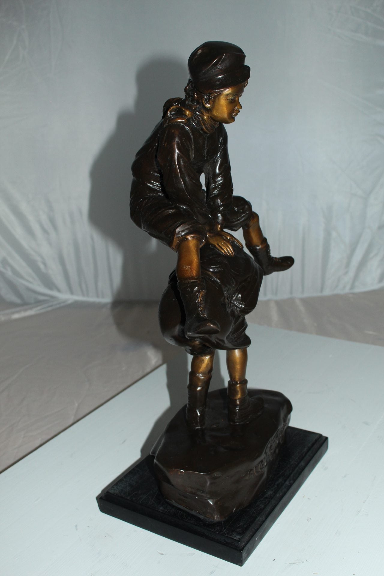 Leapfrog Bronze Statue -  Size: 12"L x 7"W x 19"H. 
