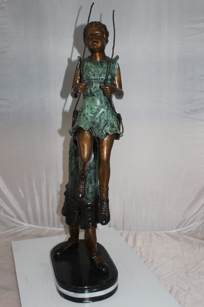 Children-on-swing-Bronze-Statue -  Size: 20"L x 9"W x 39"H. 