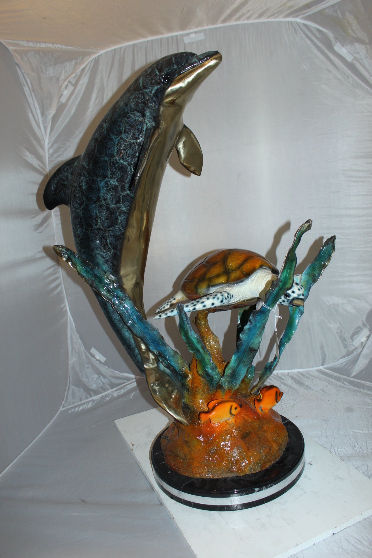 Dolphin with large turtle Bronze Statue -  Size: 30"L x 30"W x 44"H. 