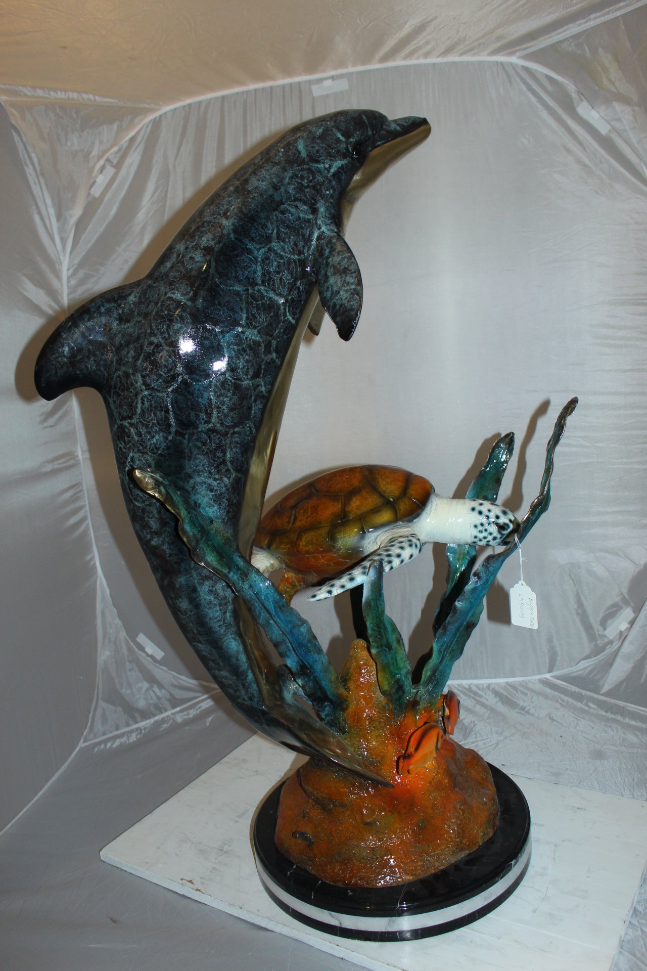 Dolphin with large turtle Bronze Statue -  Size: 30"L x 30"W x 44"H. 