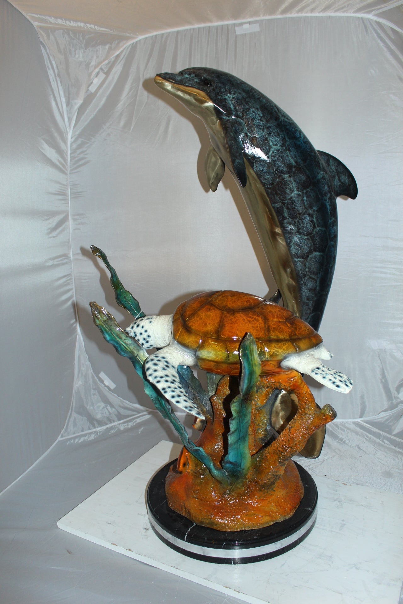 Dolphin with large turtle Bronze Statue -  Size: 30"L x 30"W x 44"H. 