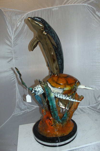Dolphin with large turtle Bronze Statue -  Size: 30"L x 30"W x 44"H. 