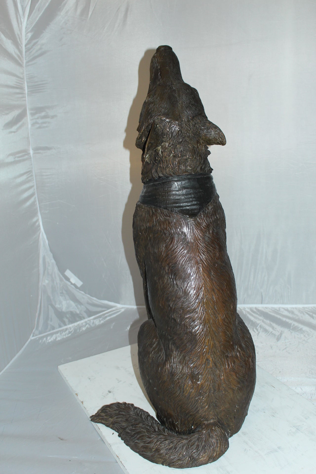 Howling Wolf Bronze Statue -  Size: 16"L x 20"W x 37"H. 