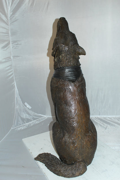 Howling Wolf Bronze Statue -  Size: 16"L x 20"W x 37"H. 