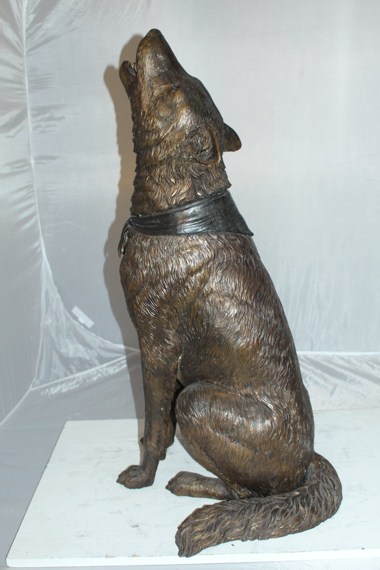 Howling Wolf Bronze Statue -  Size: 16"L x 20"W x 37"H. 