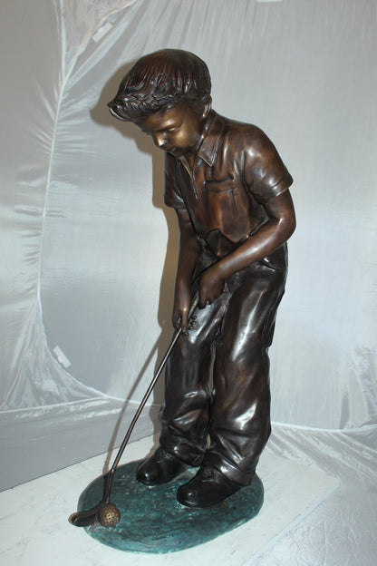 Boy plays golf Bronze Statue -  Size: 14"L x 18"W x 37"H. 