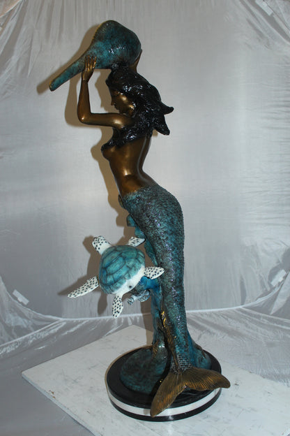 Mermaid 43 holding a shell fountain Bronze Statue -  Size: 14"L x 24"W x 43"H. 