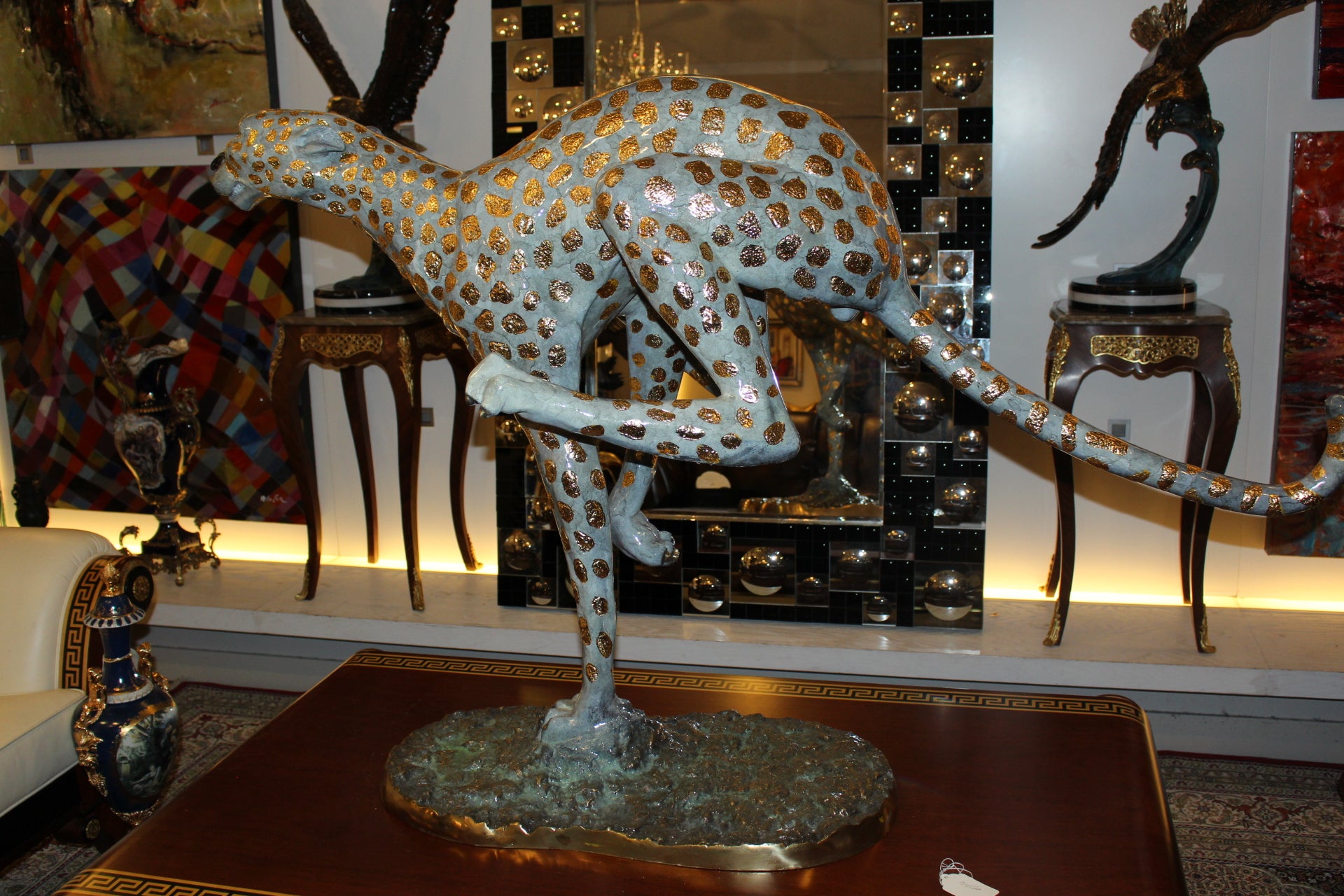 Running Cheetah - Gold Pleated Bronze Statue -  Size: 67"L x 23"W x 41"H. 